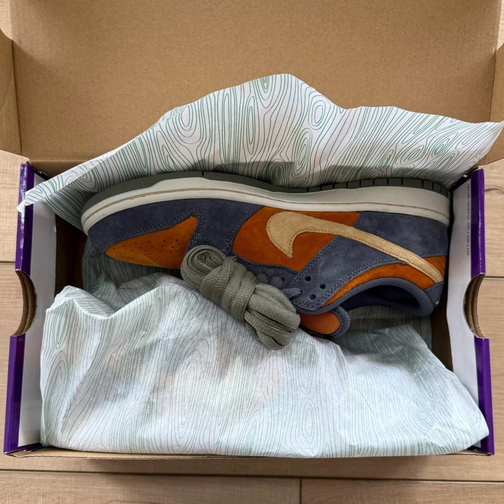 Nike Men's Low-Top Sneakers in Navy, Orange, and Cream